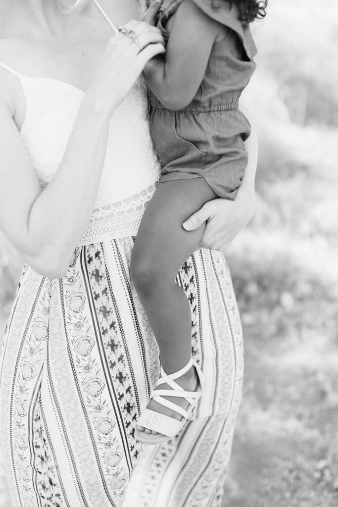 As a Moab family photographer, I have the privilege of capturing special moments against the stunning backdrop of Utah's natural wonders. Recently, I had the honor of photographing a family from Pennsylvania as they celebrated the adoption of their daughter amidst the breathtaking landscapes near Arches National Park. Meeting the Family: The Smith family's journey from Pennsylvania to the West was not just about exploring national parks; it was also a celebration of their newest addition. Their joy and love for each other were evident from the moment we met, and I knew that capturing their story would be a truly special experience. The Setting: Just outside of Arches National Park, we found the perfect spot to showcase the beauty of their family and the surrounding landscape. The red rock formations and expansive vistas provided a stunning backdrop for our session, adding an extra layer of magic to their already remarkable story. Celebrating Adoption: As we wandered through the desert landscape, I had the pleasure of documenting the love and connection between the Smith family. With each click of my camera, I could see the joy and excitement in their eyes as they celebrated the newest member of their family. Embracing the Moment: Despite the desert heat, the Smith family embraced the experience wholeheartedly, laughing and playing as we captured memories that would last a lifetime. Their adventurous spirit and genuine affection for each other made my job as their photographer an absolute pleasure. A Legacy of Love: As the sun began to set, casting a warm glow over the desert landscape, we captured some truly unforgettable moments. Against the backdrop of towering arches and majestic rock formations, the Smith family's love and happiness radiated, creating a series of photographs that will serve as cherished memories for years to come. Conclusion: As a Moab family photographer, it's moments like these that remind me why I love what I do. The opportunity to document the love and connection between families, against the backdrop of some of nature's most breathtaking landscapes, is truly a privilege. The Smith family's session near Arches National Park was a celebration of love, adventure, and the joy of welcoming a new member into their family, and I am grateful to have been a part of it. Moab Family Photographer | Waller 